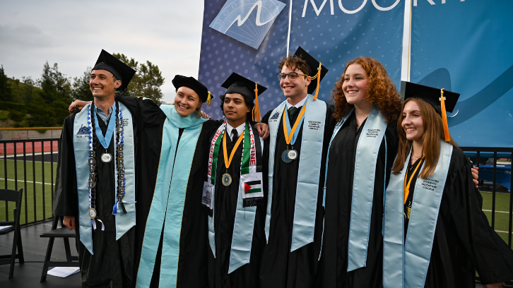 Graduating 2023-2024 ASMC officers smile for a photo